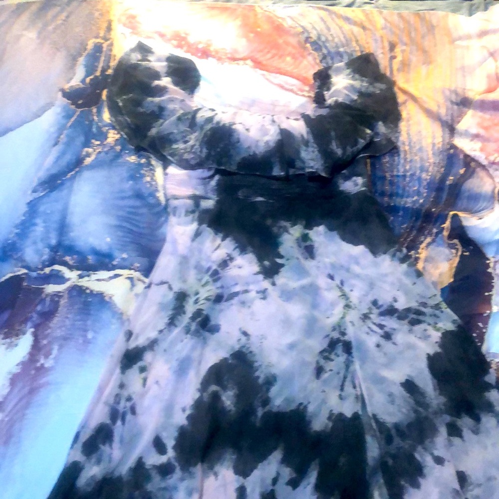 Be bold and daring in a flawless tie-dyed by me beauty. Worn once for a wedding.